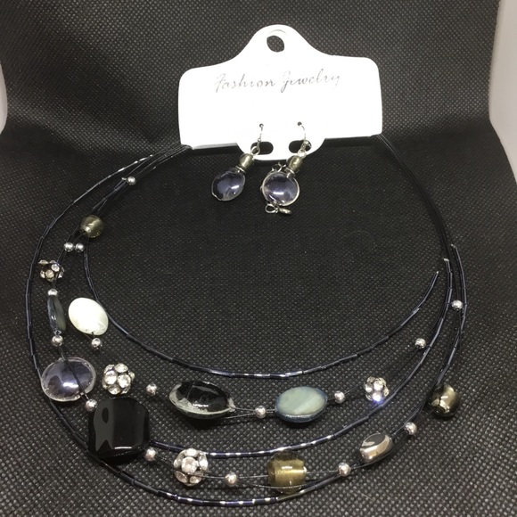 Jewelry - Multilayered necklace with matching earrings.